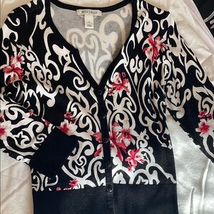 Women's Black and White Sweater with Red Floral Design